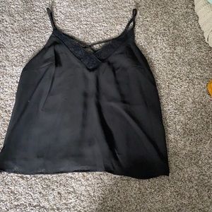 Black silk tank with some lace at the cross